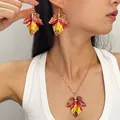 Asian model wearing a colorful maple leaf necklace and earrings jewelry set for autumn - Earrings and Necklace Set (06)