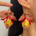 Vibrant autumn maple leaf drop earrings with red and yellow enamel color block. - Earrings (04 KC Gold a-1132)