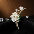 Elegant enamel flower brooch with white shell petals and sparkling zircon accents - Flower Style (Flower Brooch)