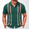 Vintage green knitted polo shirt with stylish vertical stripes and button-down front - M / Tops / Green