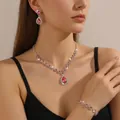 Elegant silver-tone jewelry set with red teardrop rhinestones necklace and earrings - Pear-Shaped 3-Piece Set (DZ67) / Pink