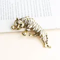Vintage leopard shaped brooch with white enamel and gold finish on book background - Antique Gold + White