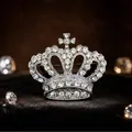 Exquisite silver crown brooch featuring sparkling clear rhinestones for elegant apparel - Silver