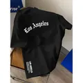 Classic black cotton short-sleeved T-shirt with bold white Los Angeles gothic letter print - S / Tops / Black