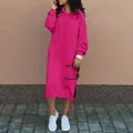 Ζωηρό ροζ oversized φόρεμα με κουκούλα, τσέπες και κορδόνι στο τελείωμα. - Τριανταφυλλί