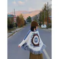 Ethnic style thick knit poncho sweater with blue floral pattern and long fringe - One Size / Tops / Off-White Jacquard Style