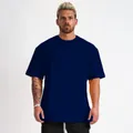 Mannen marineblauw oversized katoenen fitness t-shirt gedragen door sportmodel - Donkerblauw (Geen Logo)