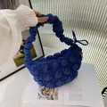 Detail shot of a royal blue bubble pleated cloud bag featuring unique puffy texture - Sapphire Blue