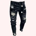 Close-up view of men's distressed skinny jeans with patches and ripped details - S / Bottom (806) / Black