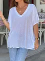 Détail d'un t-shirt blanc pour femme à col en V, coupe ample et tissu slub texturé - S / Hauts / Blanc