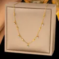 Elegant gold chain necklace featuring sparkling round zircon pendants and cube bead accents - Square and Round Rhinestone (H1200)