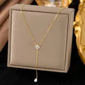 Elegant gold Y-shaped necklace featuring a sparkling zircon flower and teardrop pendant. - Rhinestone Waterdrop (H1116)