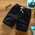 Men's black cotton linen shorts with drawstring waist for summer casual beach wear. - M / Bottoms / Black