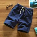 Men's casual navy blue cotton linen shorts featuring an elastic drawstring waist - M / Bottoms / Navy Blue