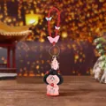 Traditional Tang style female figure keychain with pink character and butterfly charm - Smooth Success (Red Rope)