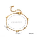 Bracelet élégant en acier titane doré avec breloques nœuds et pierres de cristal - Style Plusieurs Nœuds Strass (7793)