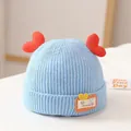 Cute light blue baby winter knitted beanie hat featuring red heart shaped decorations - One Size / GOOD Heart Style / Blue