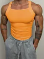 Men's vibrant orange ribbed gym tank top featuring a slim fit and square neckline design - S / Tops / Orange
