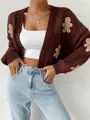 Vue détaillée d'un gilet en tricot marron avec broderie bonhomme de pain d'épices - S / Hauts / Café