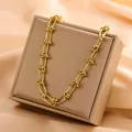 Elegant gold-plated titanium steel chain necklace with knot detail links on box - Thorn Chain Knot Style (8206) / Gold