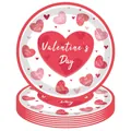 Stack of disposable Valentine's Day paper plates featuring pink hearts and romantic text - 9-inch Plates (16 Pieces) / Pink Heart