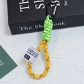 Close-up of a neon green and yellow mesh braided lanyard with a black carabiner clip. - Neon Green And Yellow Contrast Style (Huayang 4)