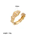 Detail view of gold geometric ring with 0.8cm width and stone inlays - Geometric Snake Head Rhinestone Style (Style 23)