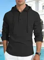 Close-up of a men's black linen long-sleeve hooded Henley shirt for casual autumn wear. - S / Tops / Black