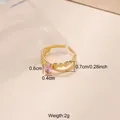 Verstellbarer 18 Karat vergoldeter Edelstahlring mit einem funkelnden rosa Zirkonia - Rosa Ovaler Stil (CXR00815G) / Einstellbar Offen / Gold
