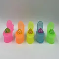 Creative set of five colorful translucent toy toilets with pop-out glittery poop squishies. - Creative Toilet Squishy / Mix Colors