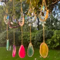 Group of moon crystal suncatchers with natural agate slices and sparkling prisms. - Blue