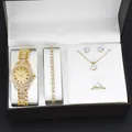 Vista dettagliata del set orologio e gioielli dorati da donna in una confezione regalo - Set Orologio Decorazione Pietra Singola / Con confezione regalo nera / Oro