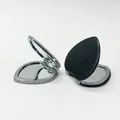 Espejos de maquillaje plegables en forma de corazón con purpurina plateada y negra - Negro