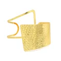 Detailed view of a gold-tone metal cuff bracelet with a hammered honeycomb texture - Gold Color Bracelet