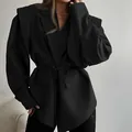 Elegant black women's V-neck waist-tie blazer jacket with structured shoulders and pockets - Black