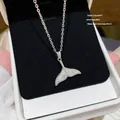 Elegant silver stainless steel whale tail pendant necklace with sparkling stones for women - Whale Tail (X090) / Silver
