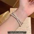 Detail of French vintage multi-strand pearl bracelet with sparkling rhinestone charm - Elastic Cord Beaded Style (2#) / Diameter approx 9.5cm / Pink