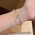 Close-up of a French vintage pearl and silver bead multi-strand bracelet on a wrist. - Metal Sequin Splicing Style (4#) / 17.3cm+6.6cm Extension Chain / Silver-Pink