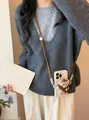 Close-up of a stylish crossbody phone lanyard featuring a cute plush teddy bear pendant - Accessory-Coffee-White