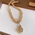 Collier tressé bohème vintage à plusieurs brins avec pendentif en pierre goutte et cristaux - Style Pendentif Goutte d'Eau / Collier-Jaune