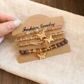 Detail of four-piece beaded bracelet set with gold butterfly charms and amber beads - 7# Butterfly 4-Piece Set
