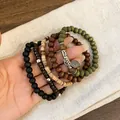 Close-up of Bohemian multi-layer wooden beaded bracelet set with vintage leaf charm - Leaf Charm (13#) / Black-Coffee-Green