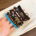 Close-up of Bohemian multi-layer bracelet set with turquoise beads and butterfly charm - Butterfly Charm (21#) / Brown Blue
