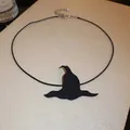 Macro detail view of Halloween black witch hat pendant on adjustable cord choker - Minimalist Witch Hat Choker