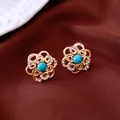 Elegante 14k vergulde bloem oorknopjes met turquoise en sprankelende zirkoon accenten - Oorknopje (1#) / Goud-Blauw