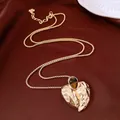 14k vergulde ketting met getextureerde harthanger en een bruine edelsteen inleg - Halsketting (27#) / Goudbruin