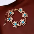 Elegante 14k vergulde bloemenarmband met turquoise stenen en fonkelende zirkonen. - Armband (Stijl 2) / Goud-Blauw