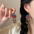Ethnic style circular woven drop earrings with red and blue threads and leaf charms - Ear Hook - Gold - Red - Blue