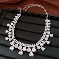 Prachtige elegante zirkonia kwastjes ketting met hartvormige stenen op zwart plateau - Kwastje Ketting (20#) / Zilver