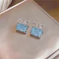 Elegant light blue rectangular zircon earrings with sparkling crystal butterfly accents - Silver Earring Post-Blue